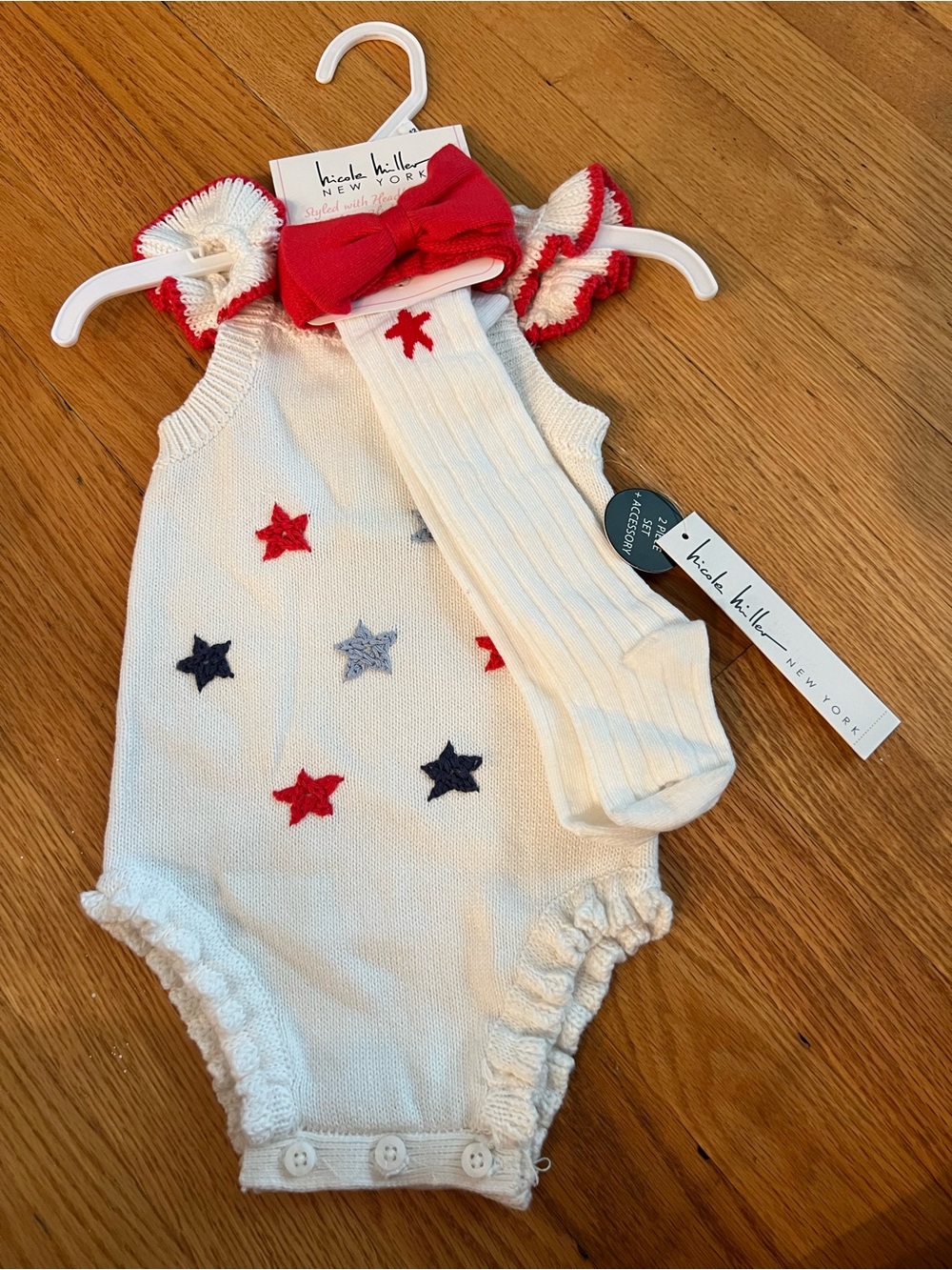 Nicole Miller White Knit Baby Romper with Red & Navy Stars and Bow & socks